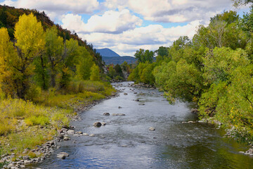 Yampa River flowing through Steamboat Springs Colorado - obrazy, fototapety, plakaty