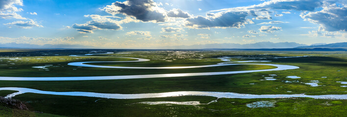 Bayinbuluke Grassland and winding river natural scenery in Xinjiang,China.The winding river is on...