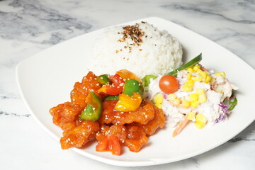 Sweet and sour fish with rice