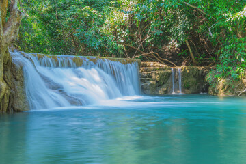 Fototapeta na wymiar wonder Waterfall in deep rain forest jungle (Huay Mae Kamin Waterfall National Park in Kanchanaburi Province, Thailand)