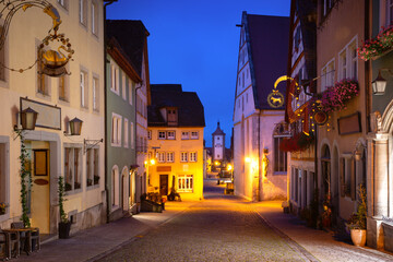 Fototapeta premium Night Market square in medieval Old Town of Rothenburg ob der Tauber, Bavaria, southern Germany