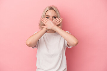 Young caucasian woman isolated on pink background doing a denial gesture
