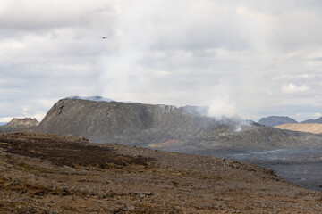 Spectacular helicopter tour over the lava fields and Fagradalsfjall volcano crater, Iceland.