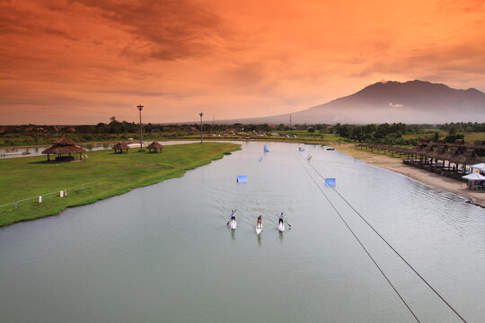 Cable wake board park, Camarines Sur. Philippines. SUP stand up paddlers palling in the lake