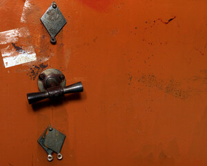 Rusted blue brown door of a vault or safe