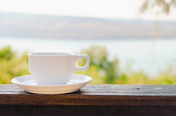 a white cup of coffee