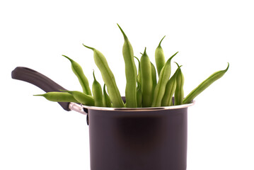 Handful of green beans in the pot isolated on white
