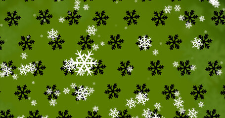 Image of falling snowflakes on green background