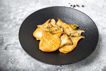 fried grill eryngii slice Oyster mushroom King mushrooms Eringi second course fresh meal snack on the table copy space food background keto or paleo diet veggie vegan or vegetarian food no meat