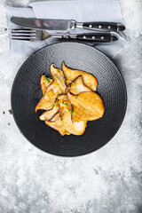 fried grill eryngii slice Oyster mushroom King mushrooms Eringi second course fresh meal snack on the table copy space food background keto or paleo diet veggie vegan or vegetarian food no meat