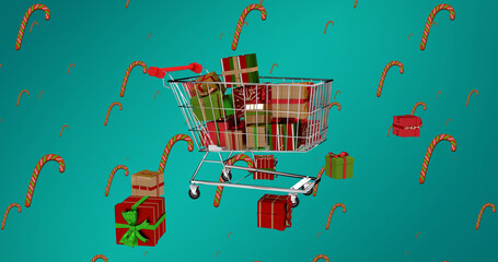 Image of falling christmas gifts and candy canes over shopping cart