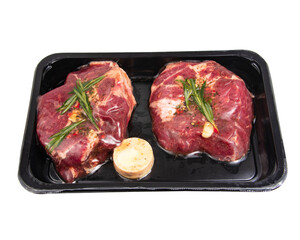 Fresh meat steak in vacuum pack plastic container isolated on the white background