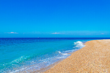 Elli beach landscape Rhodes Greece turquoise water and Turkey view.