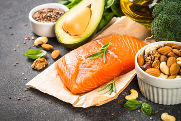 Healthy fats products. Source of Omega 3 and Omega 6. Salmon fish, olive oil, flax seeds oil, avocado and nuts.