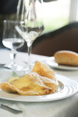 Traditional Tunisian fried pancake stuffed with egg