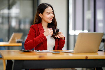 Portrait of Financial Businesswomen analyzes the graph of the company's performance to create profits and growth, Market research reports and income statistics, Financial and Accounting concept.