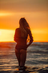 girl on the beach at sunset
