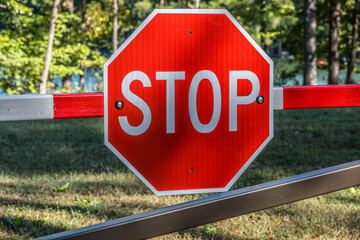 Red stop sign on a gate