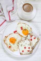 Scrambled eggs with coffee on white background