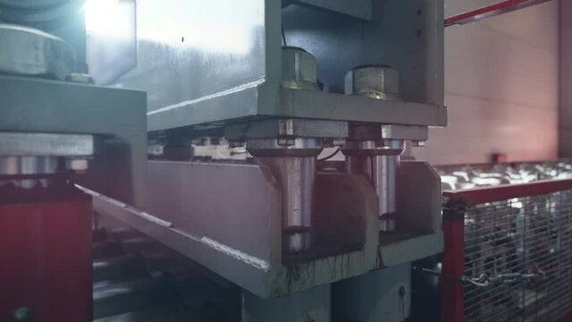 Metal roof tile for building facade automated production line at factory from galvanized steel sheet in rolls.