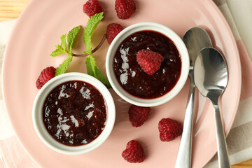 Concept of tasty food with raspberry jam, top view