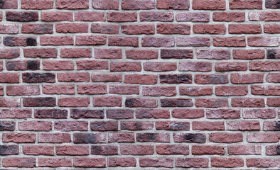 Seamless texture of the dark red brick wall. Old brickwork.