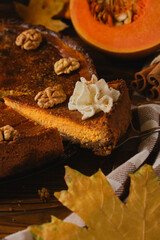 Fresh homemade pumpkin pie on the wooden table