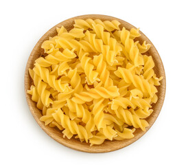 raw Fusilli pasta in wooden bowl isolated on white background with clipping path and full depth of field. Top view. Flat lay