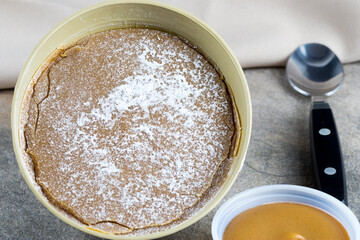 Traditional Christmas dulce de leche from the Valle del Cauca region of Colombia called Dulce de Manjar Blanco packaged in a container of plant origin fruit of the totumo tree