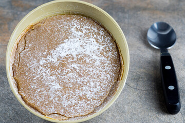 Traditional Christmas dulce de leche from the Valle del Cauca region of Colombia called Dulce de Manjar Blanco packaged in a container of plant origin fruit of the totumo tree