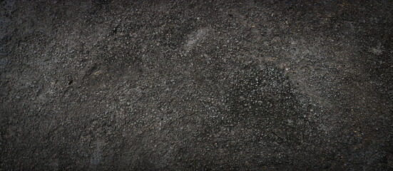 Obraz premium Black rough concrete surface, dark scary background, grunge texture.