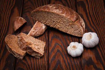 black bread on a wooden table still life