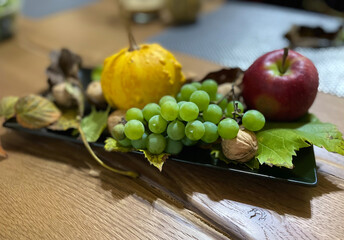 a platter of autumn fruits