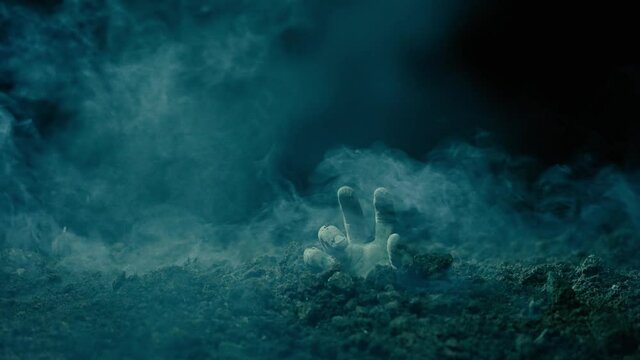 Zombie rising from the grave