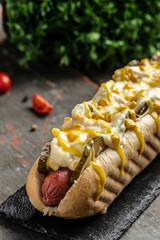 fresh delicious hotdog with homemade sausage wrapped hot dogs with cheese and corn. vertical image....