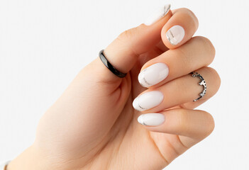 Beautiful groomed womans hand with modern french nail design on white background