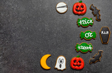 halloween cookies on stone background copy space