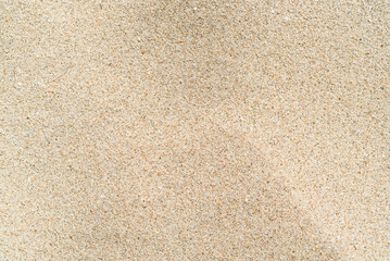 Texture of sand on the beach background pattern