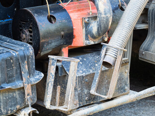 pump of cesspool emptying machine close up outdoors - obrazy, fototapety, plakaty