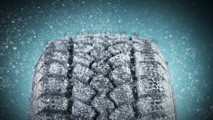 Winter Car tire with snow in detail