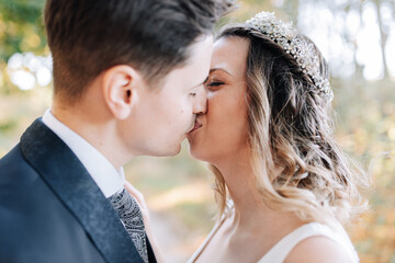 Portrait of a just married couple kissing