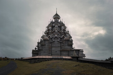 The Church of the Transfiguration of the Lord in the museum of the Kizhi reserve is part of the temple complex of the Kizhi churchyard. Karelia, Russia in gloomy weather.