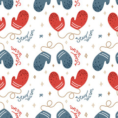 Cute seamless pattern with winter mittens and inscriptions. White background. For prints, backgrounds, wrapping paper, textile, linen, wallpaper, etc. 