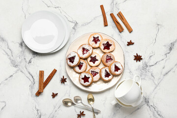 Plate with tasty Linzer cookies on white background