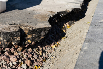 old asphalt with large cracks