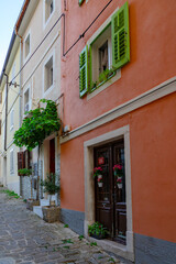 Colorful narrow idyllic street of Piran Slovenia