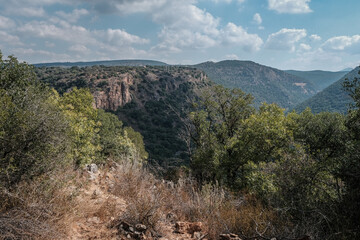 Naklejka premium View of Western Galilee mountains as seen from the scenic trail to Ein Tamir Spring, Montfort Nahal Kziv National park, Northern District of Israel, Israel. 