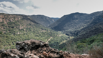 View of Western Galilee mountains as seen from the scenic trail to Ein Tamir Spring, Montfort  Nahal Kziv National park, Northern District of Israel, Israel.    