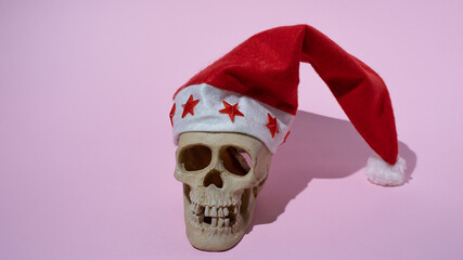 human skull with Santa Claus hat
