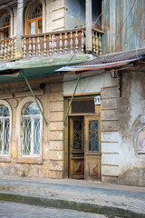Fototapeta na wymiar beautiful balconies in a house in kutaisi